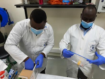 RAIDER trainees prepare a sample for transport. GARC rabies surveillance.