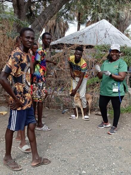 ASAL eXtension team Dr Gitonga vaccinating a dog