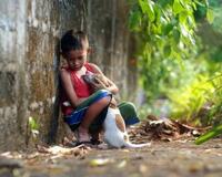 Boy hugging dog. #LovingDogsIsGlobal