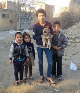 Family children bring their dog for vaccination 