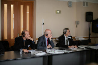 3 Serbian participants listen to the speeches during the 1st International Science Conference "Together Against Rabies"