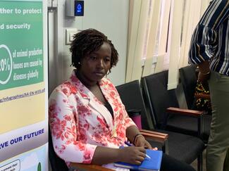 Female Journalist, Nana Kargbo listens attentively 