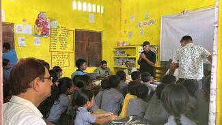Dr. Anjan Jyoti Nath, Organising Secy of World Rabies Day, 2024 at LCVSc, addressing the students at Diju Chapari school