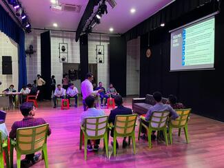 Quizmaster Dr. Prasanta Chabukdhara conducting the quiz