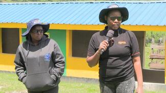 Responding to questions from farmers