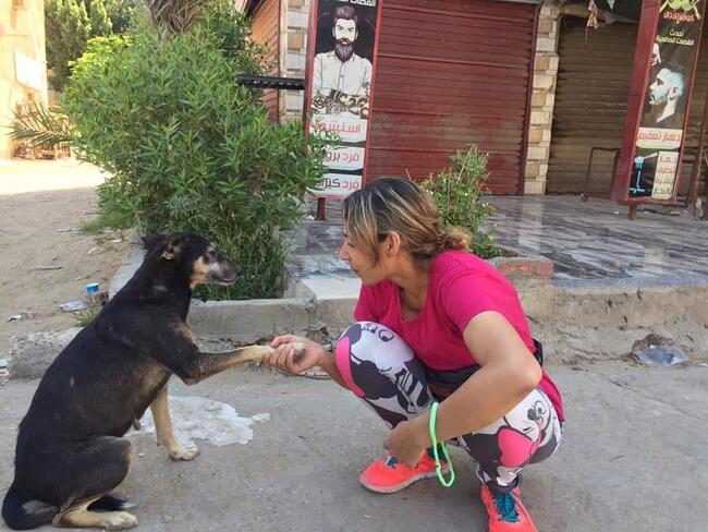Woman with dog in Egypt