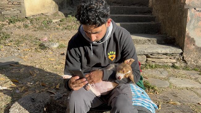 Dharamsala Animal Rescue team with dog
