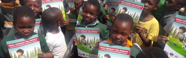Zimbabwe children with Want a Friend booklet